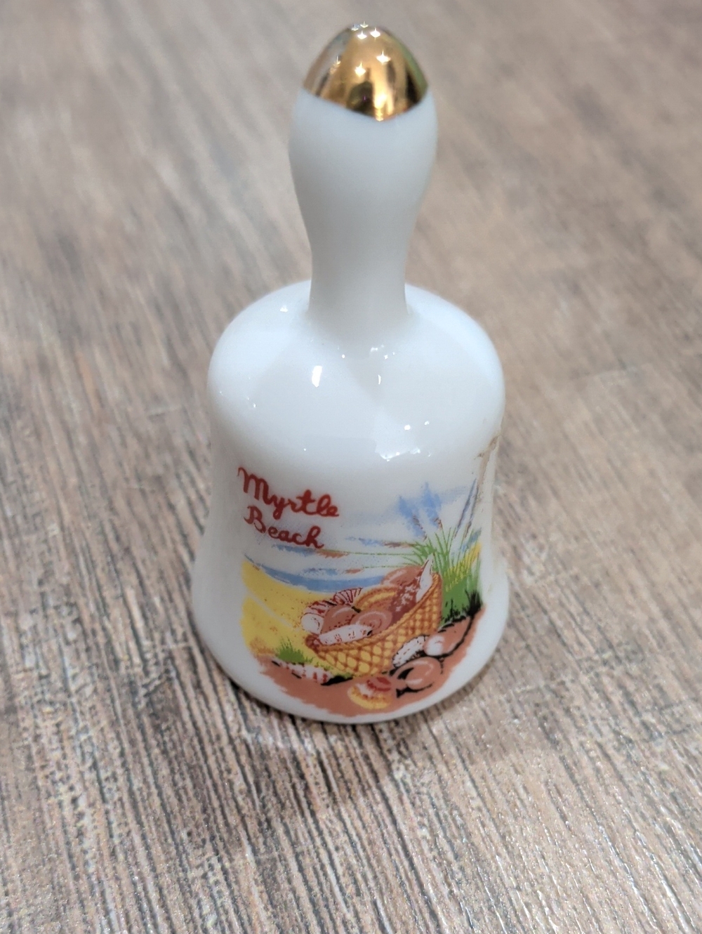 Mini Myrtle Beach Souvenir Porcelain Bell with Gold Tip